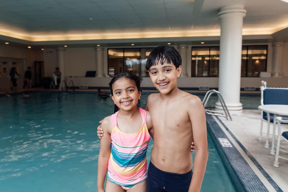 Two smiling children at PRO Club Aquatics