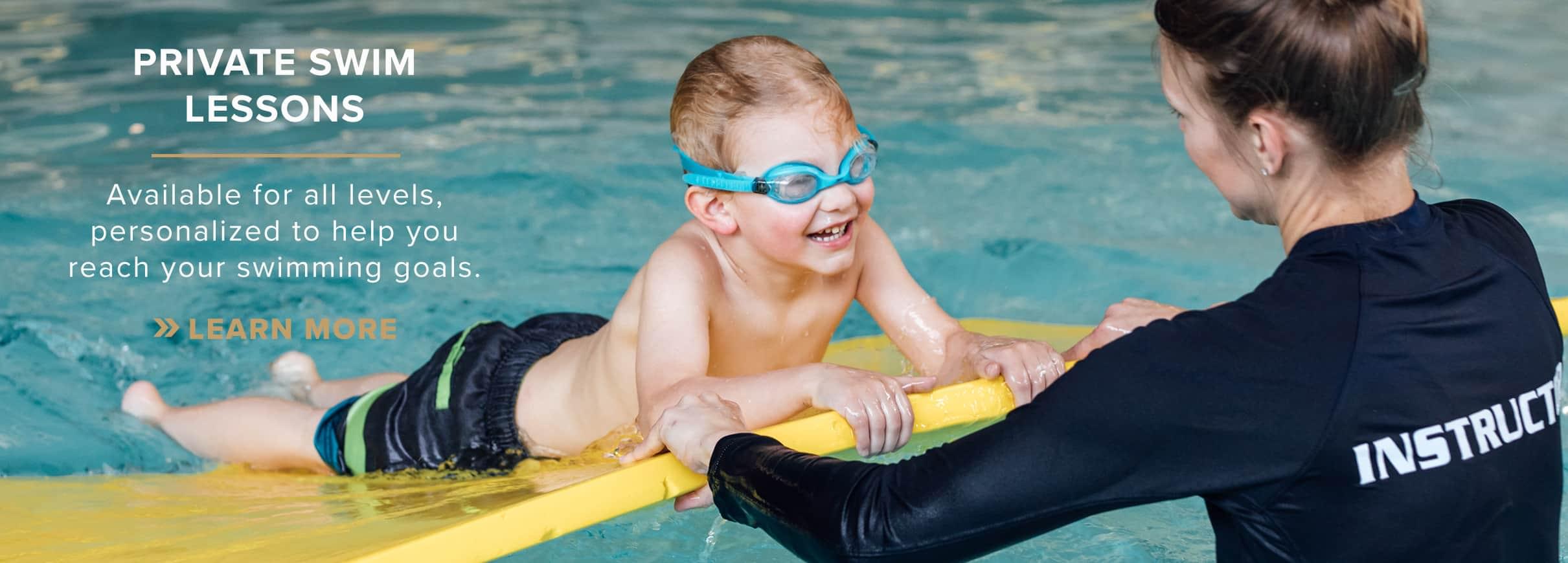 Private swim lesson being given to child by female instructor at PRO Club