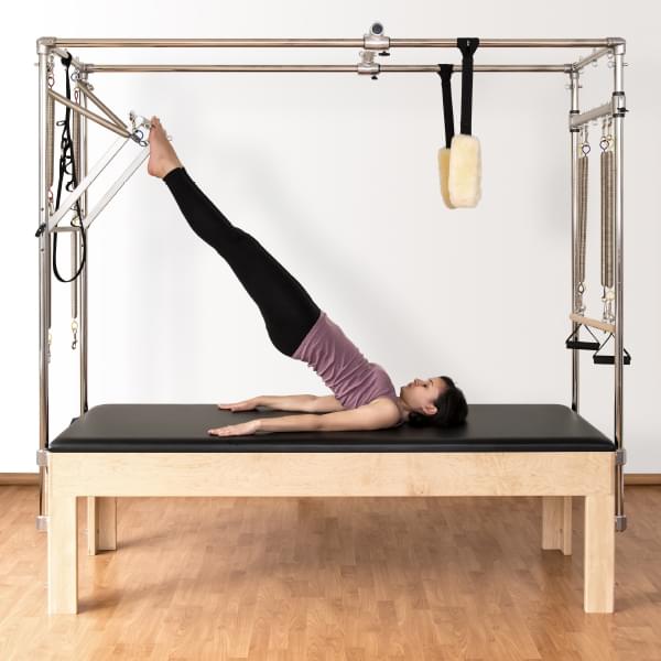 Woman working out in Pilates facility at PRO Club