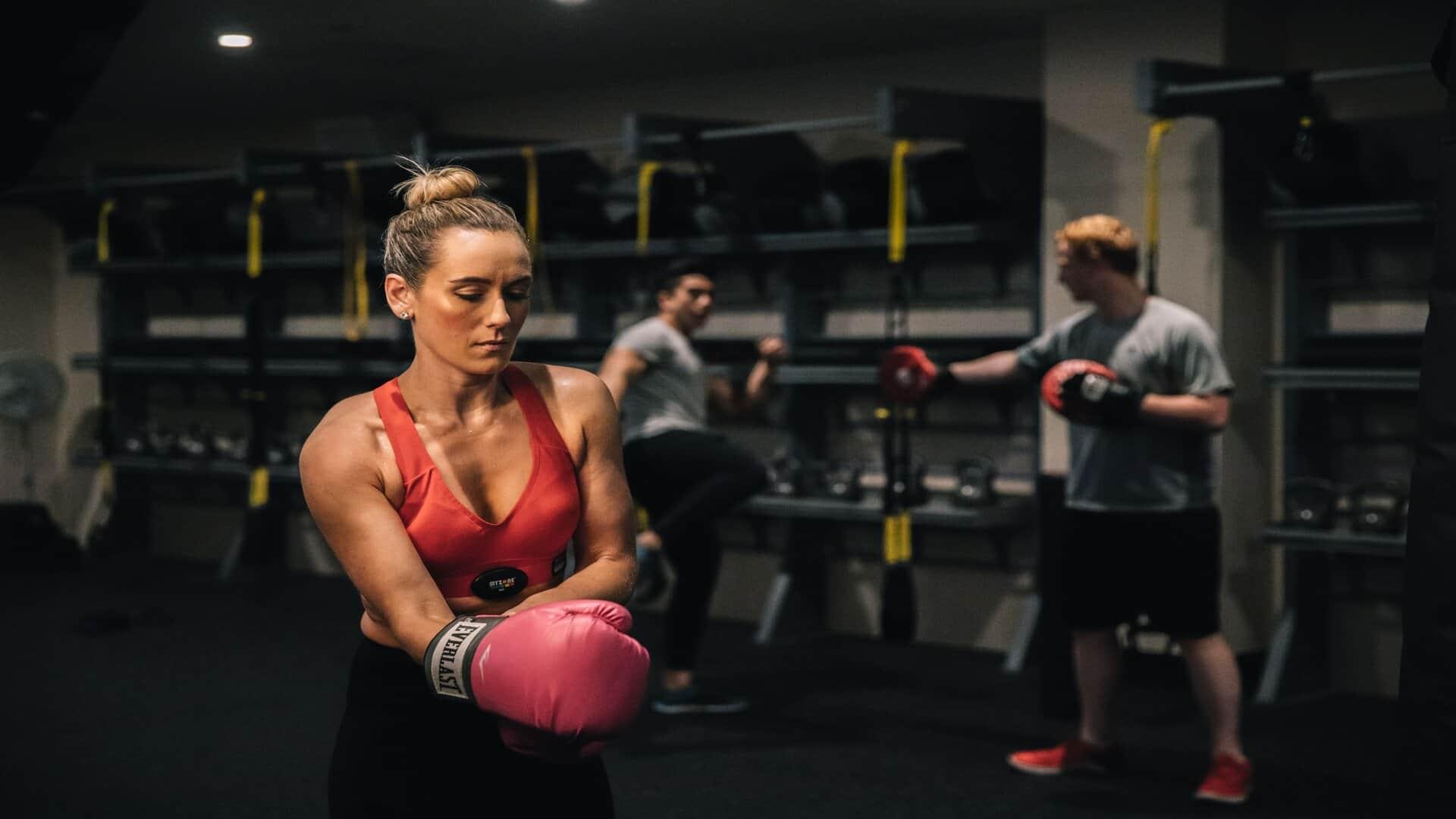 Woman preparing to practice boxing at PRO Club - Seattle