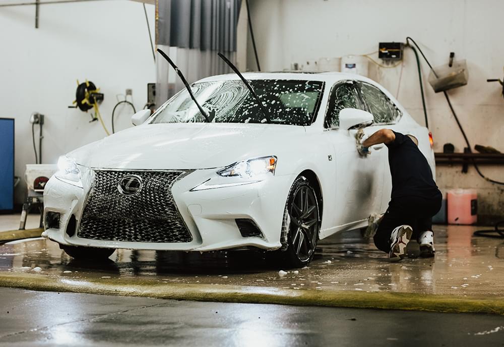 A Lexus getting washed at the Pro Club Auto Salon