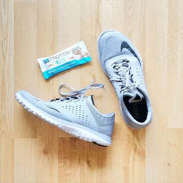 a 2020 lifetyles protein bar and a pair of running shoes