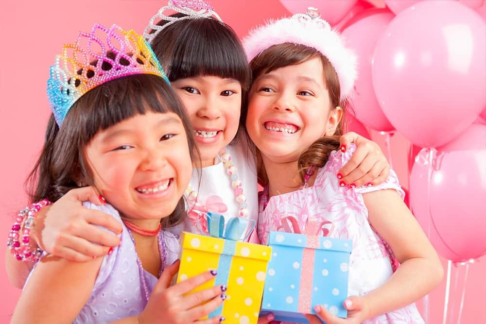 Three young ladies celebrating a birthday