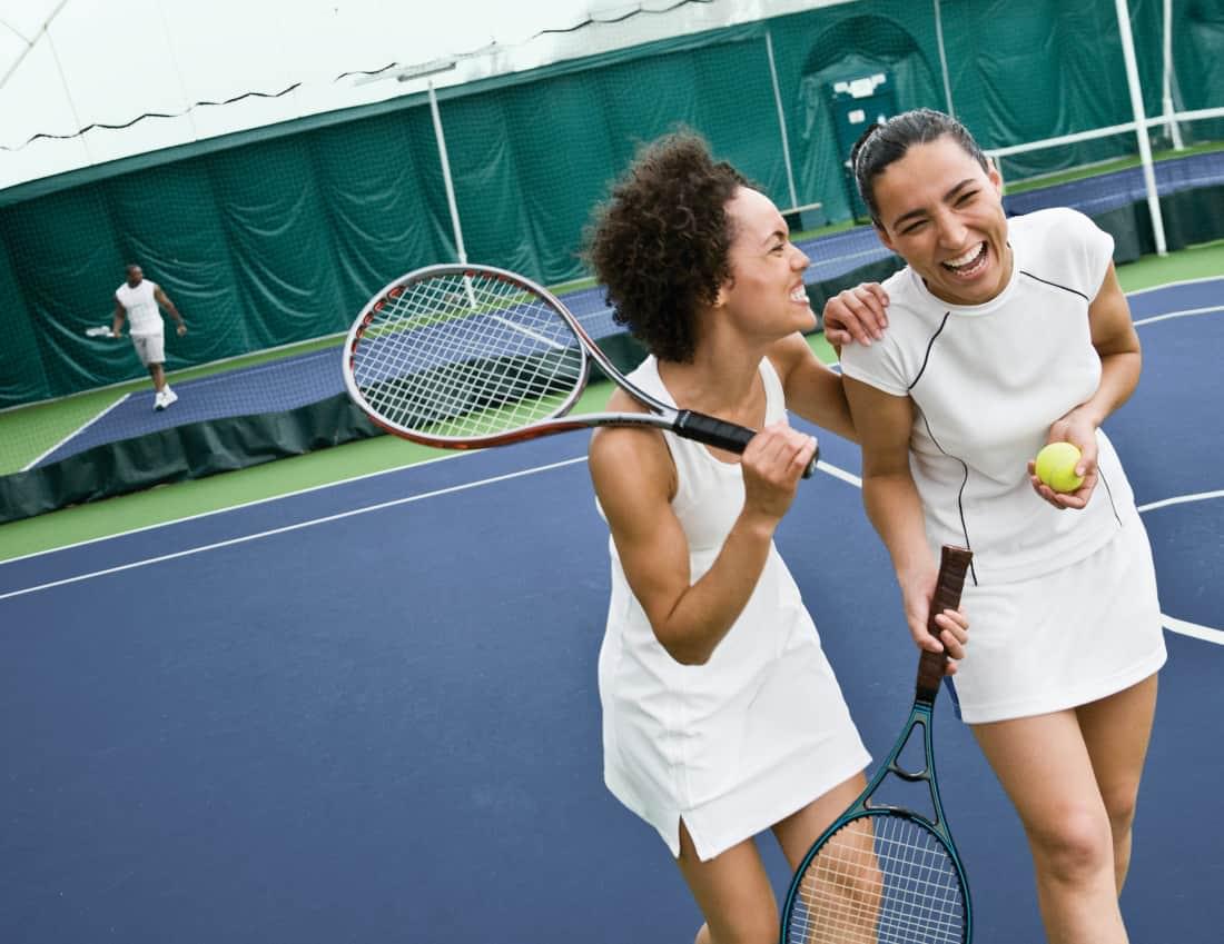 Two women enjoying themselves after playing tennis at PRO Club